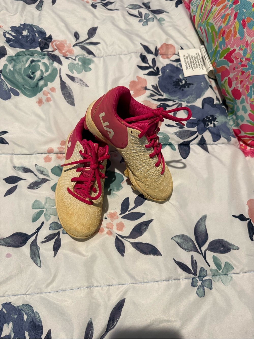 Under Armour Kids Cream and Pink cleats 12